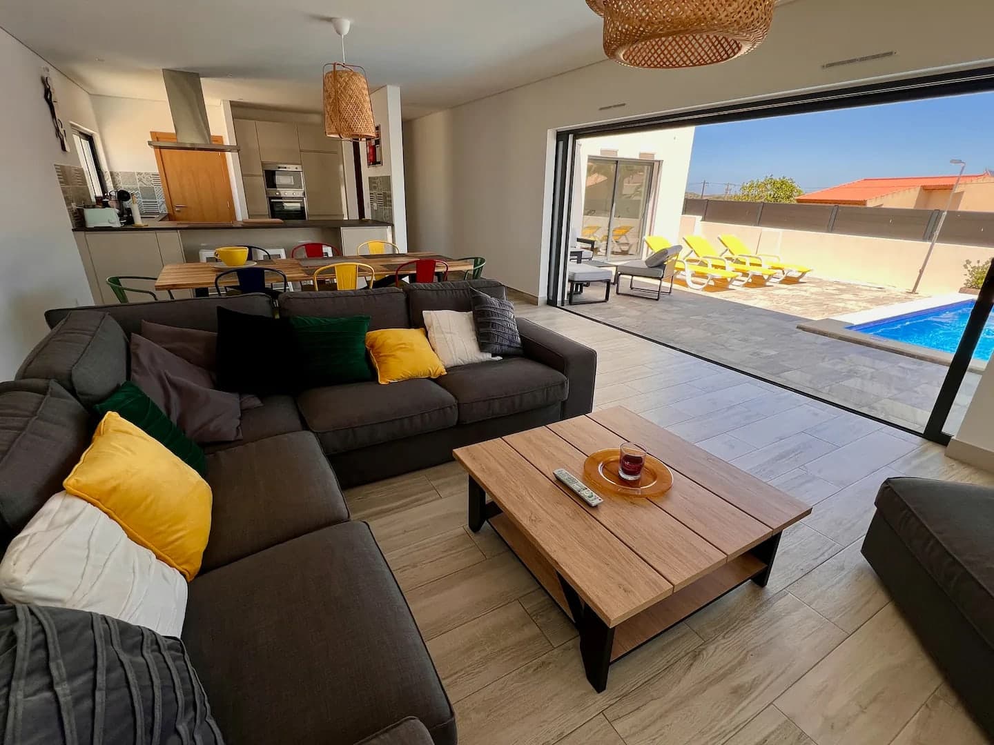 Living room opening directly onto the pool terrace